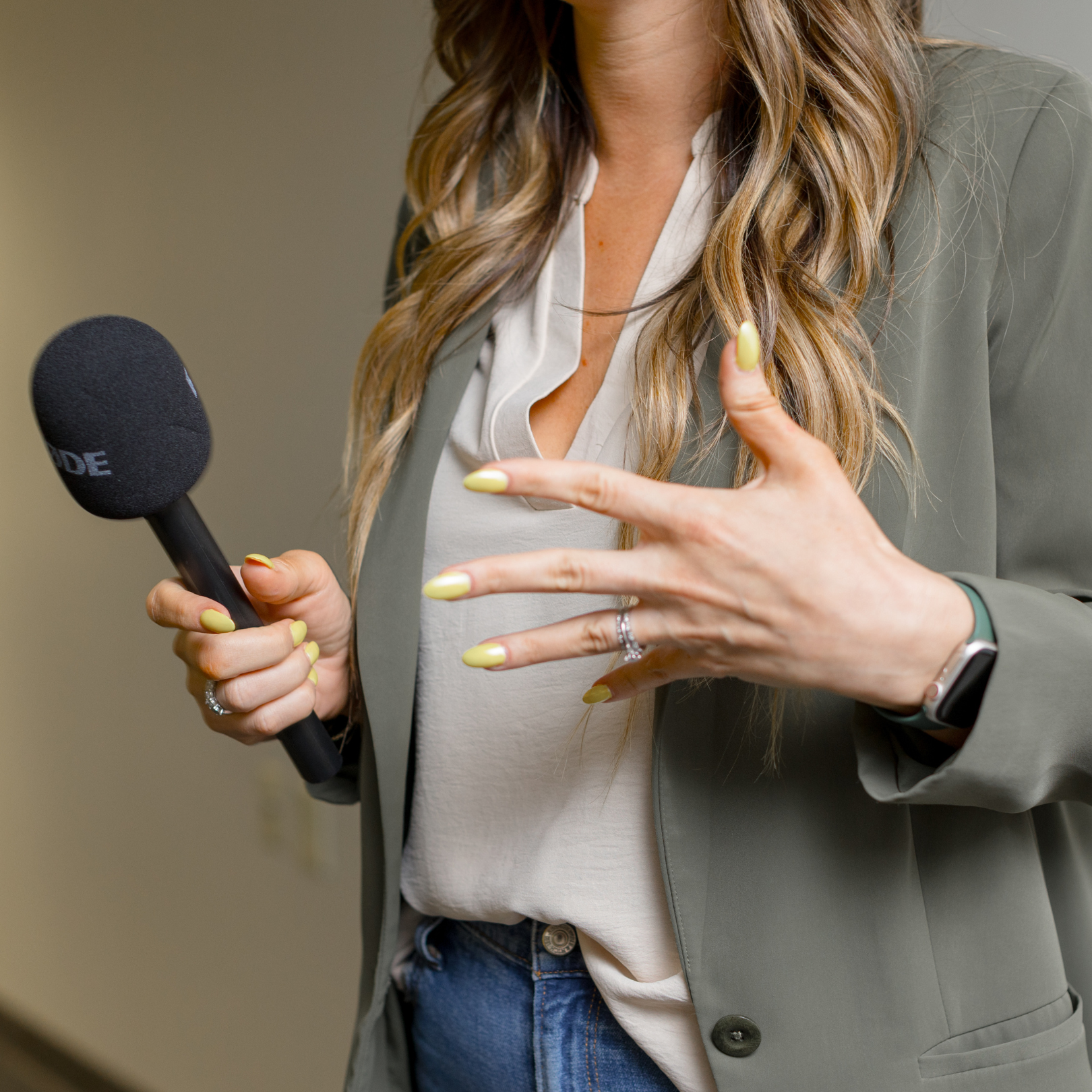 kelly with microphone square